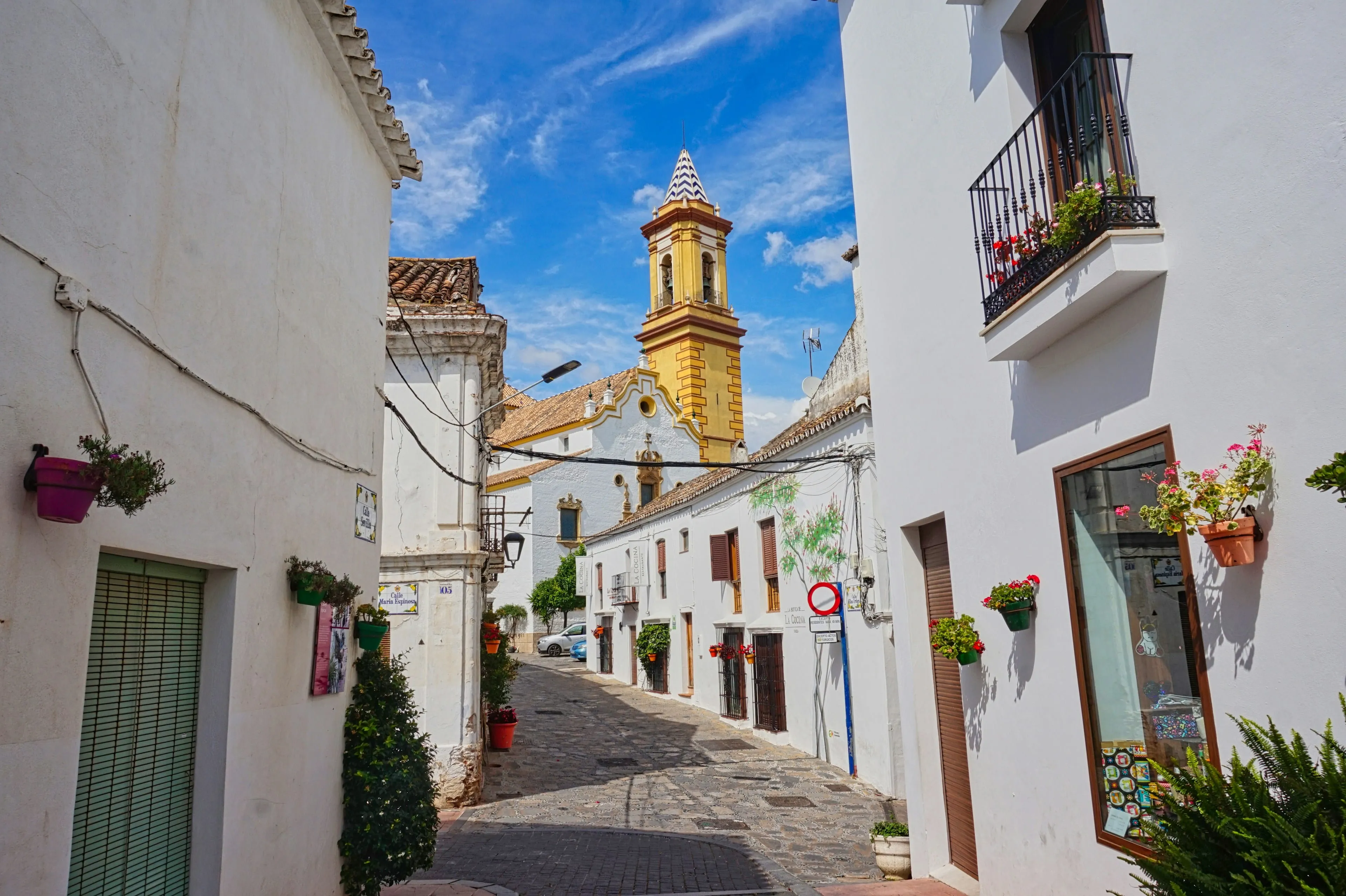 Estepona's old town beneath the Nuestra Señora de los Remedios clocktower