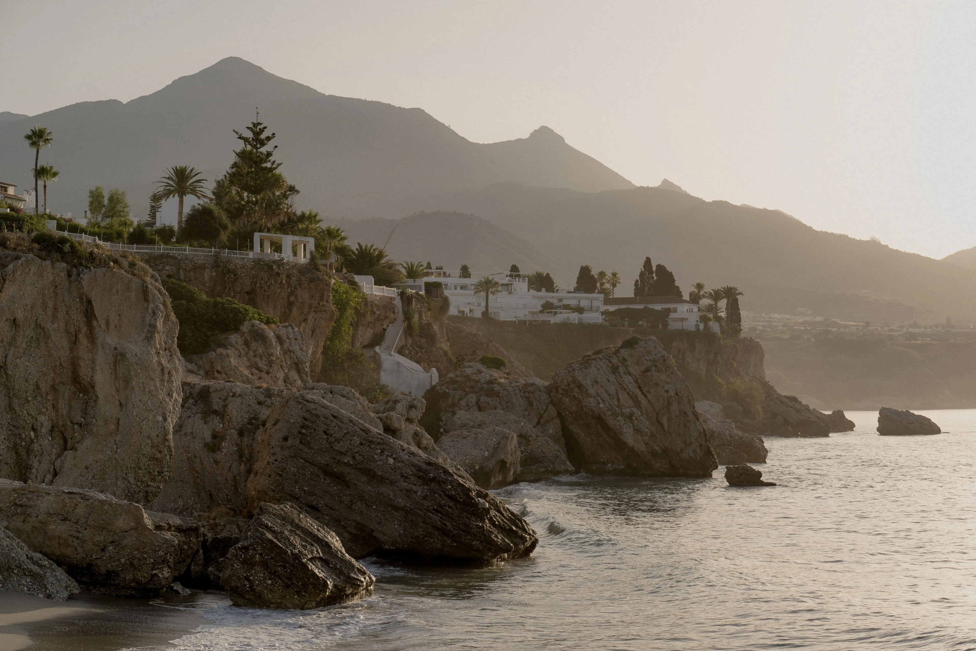 The cliffs at Nerja at sunrise, where the Sierra Almijara drops into the Mediterranean