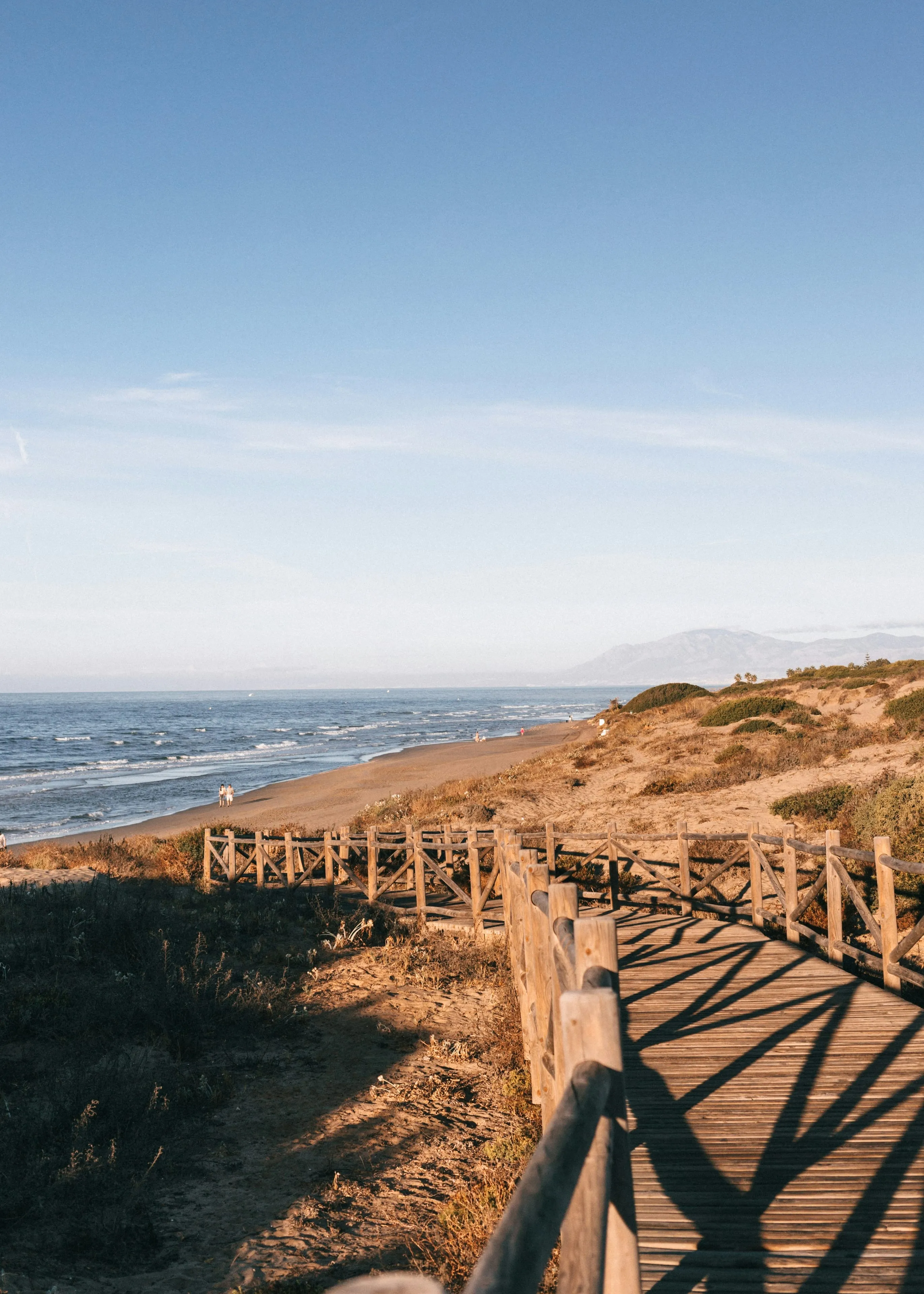 The boardwalk through the Artola dunes at Cabopino, east Marbella, at golden hour